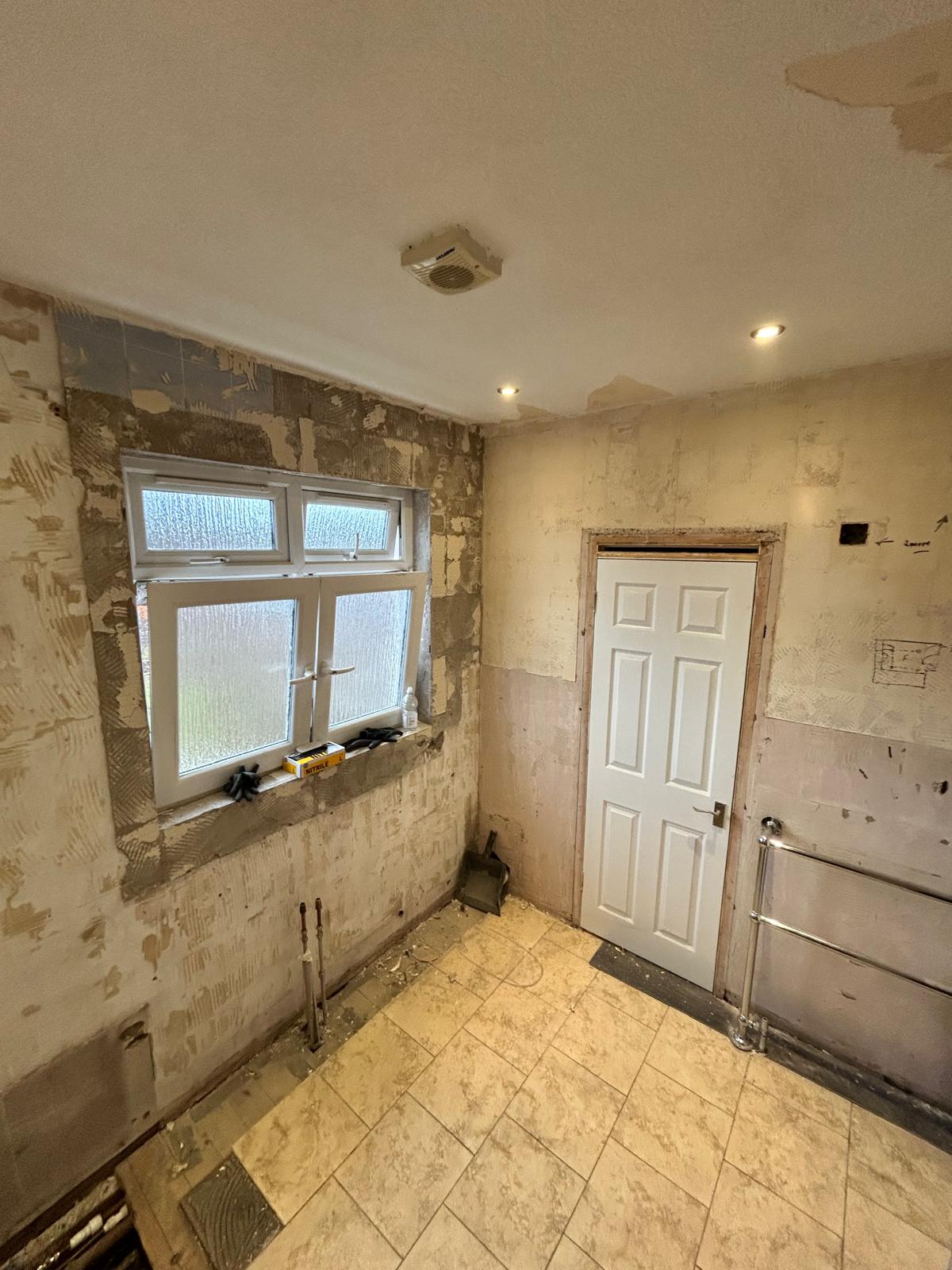 Waterproofing or preparation work for a shower area before tiling