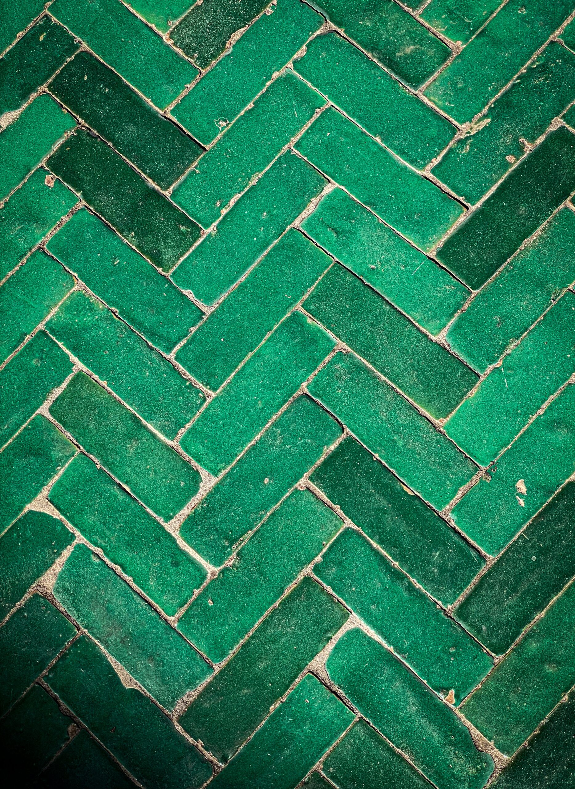 Earthy green tiles in a modern bathroom